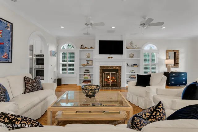 a living room with furniture or fireplace and a flat screen tv