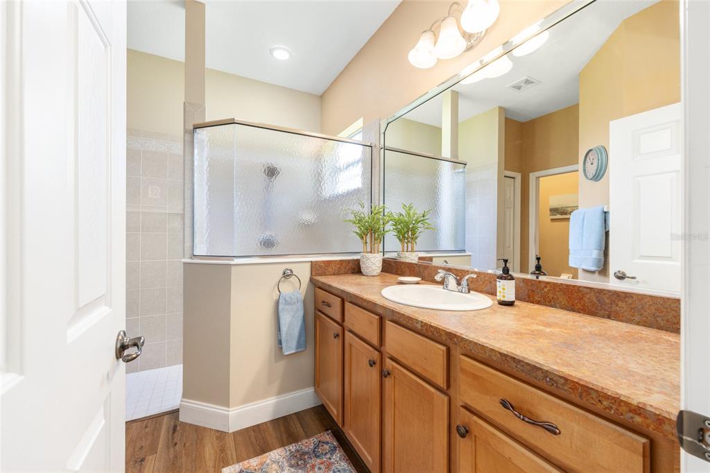 19639 Southwest 77th Loop Dunnellon, FL 34432 - Photo 33 of 59 a bathroom with a sink and a mirror
