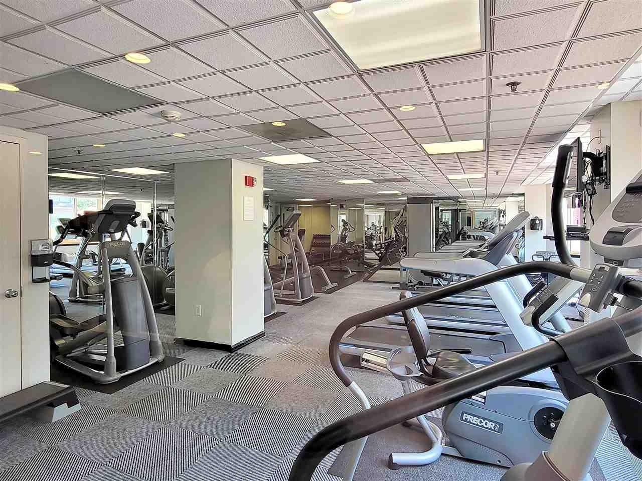 1 2nd Street, Unit 1105 Jersey City, NJ 07302 - Photo 14 of 17 a view of a room with gym equipment