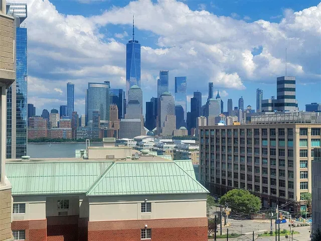 a view of a city with tall buildings