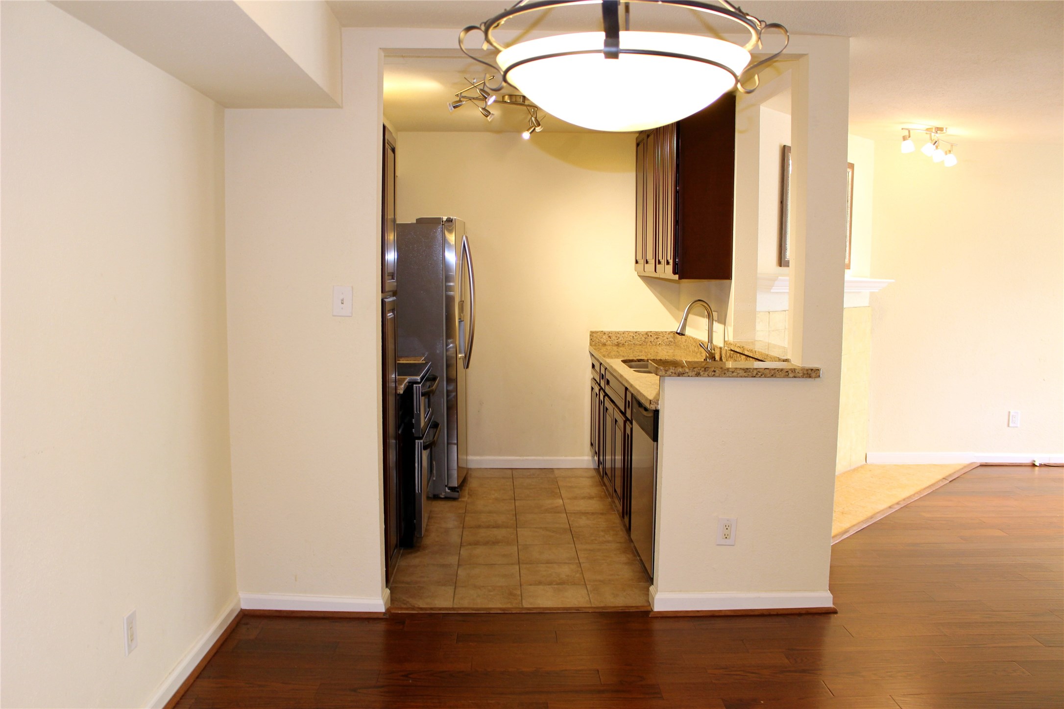 4635 Wild Indigo Street, Unit 515 Houston, TX 77027 - Photo 2 of 14 Kitchen and living area is open space.