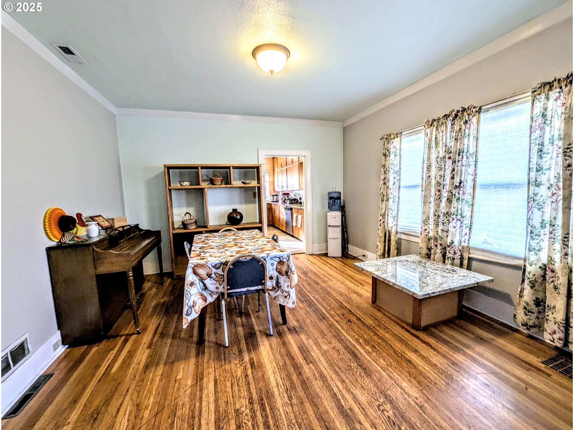 1302 9th Street La Grande, OR 97850 - Photo 4 of 15 a living room with furniture and a wooden floor
