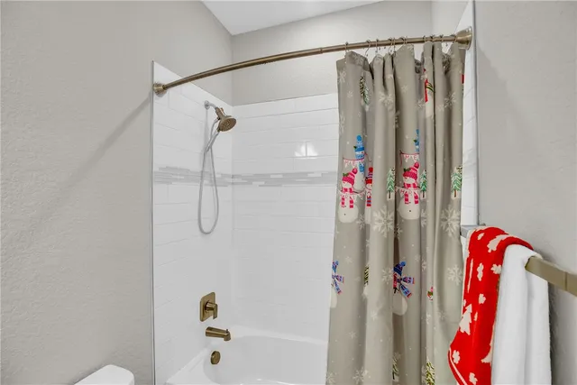 a workspace with wooden floor and a window