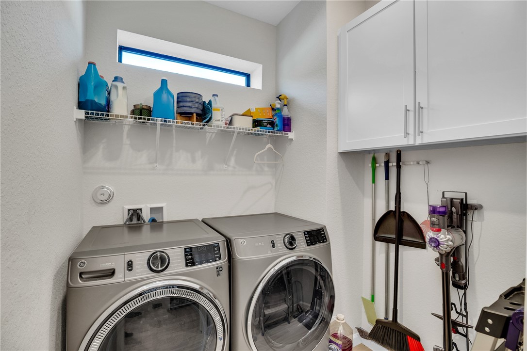 5292 Unity Square Vero Beach, FL 32967 - Photo 24 of 36 a view of storage and utility room with washer and dryer