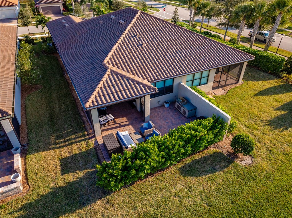 5292 Unity Square Vero Beach, FL 32967 - Photo 33 of 36 a front view of a house with garden