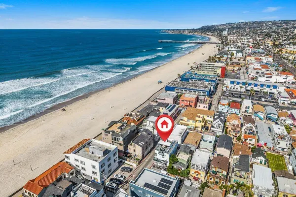 a view of a city with an ocean view