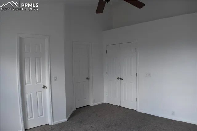 a view of hallway with chandelier