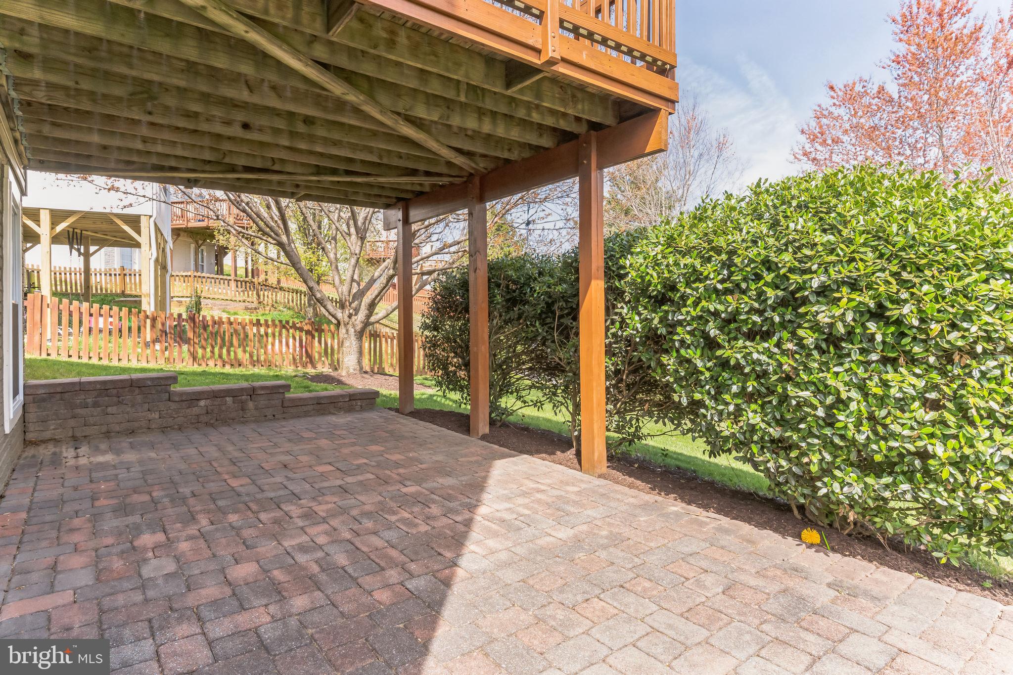 5500 Hobsons Choice Loop Manassas, VA 20112 - Photo 6 of 9 Paver patio is perfect for hosting a cookout.