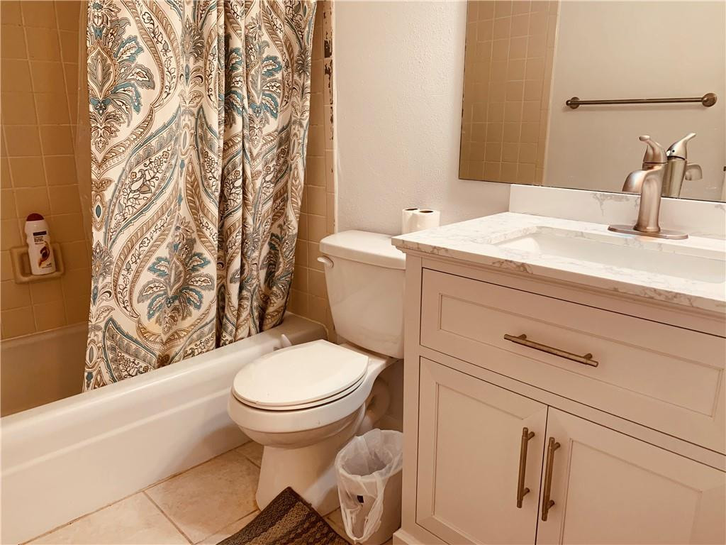 1700 Southwest 16th Court, Unit P6 Gainesville, FL 32608 - Photo 7 of 7 a bathroom with a sink and a toilet
