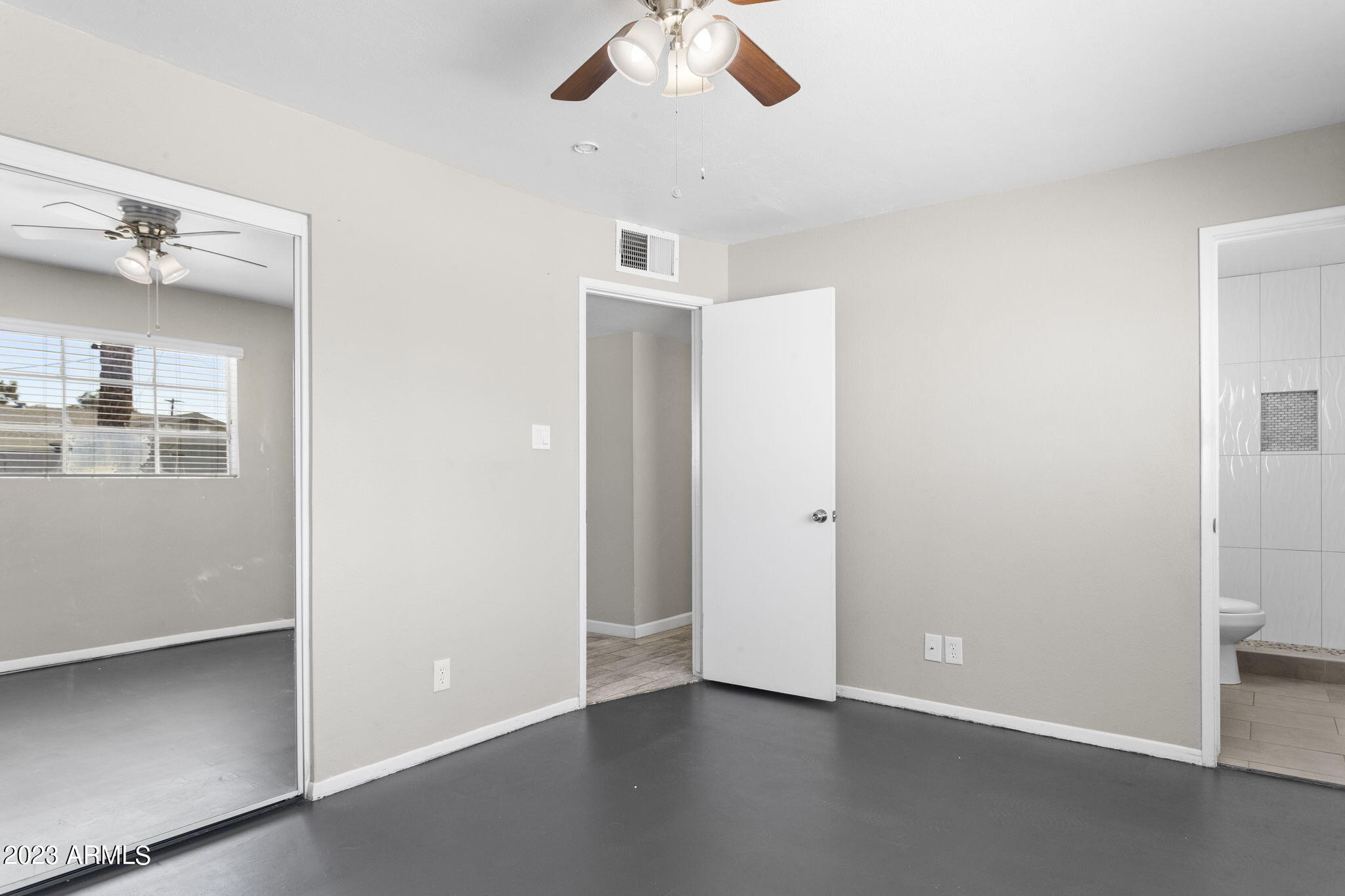 2525 West Freeway Lane Phoenix, AZ 85021 - Photo 18 of 41 wooden floor in an empty room