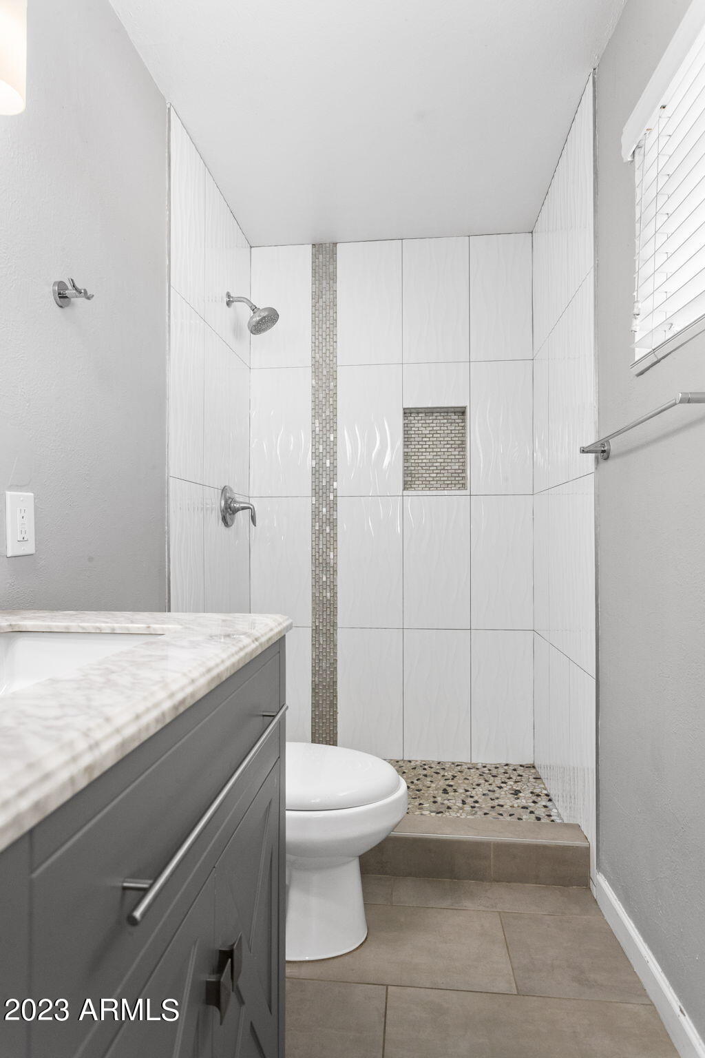 2525 West Freeway Lane Phoenix, AZ 85021 - Photo 20 of 41 a bathroom with a granite countertop sink toilet and shower