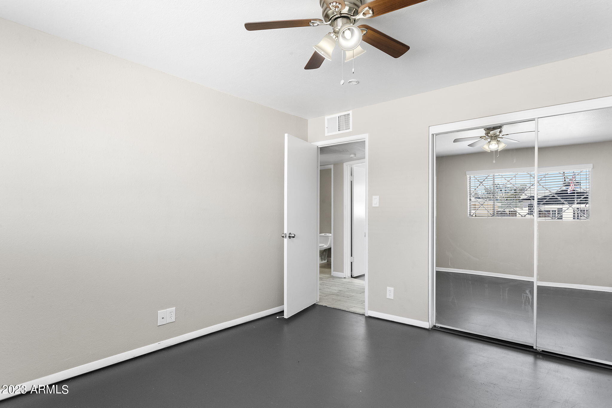 2525 West Freeway Lane Phoenix, AZ 85021 - Photo 23 of 41 wooden floor in an empty room