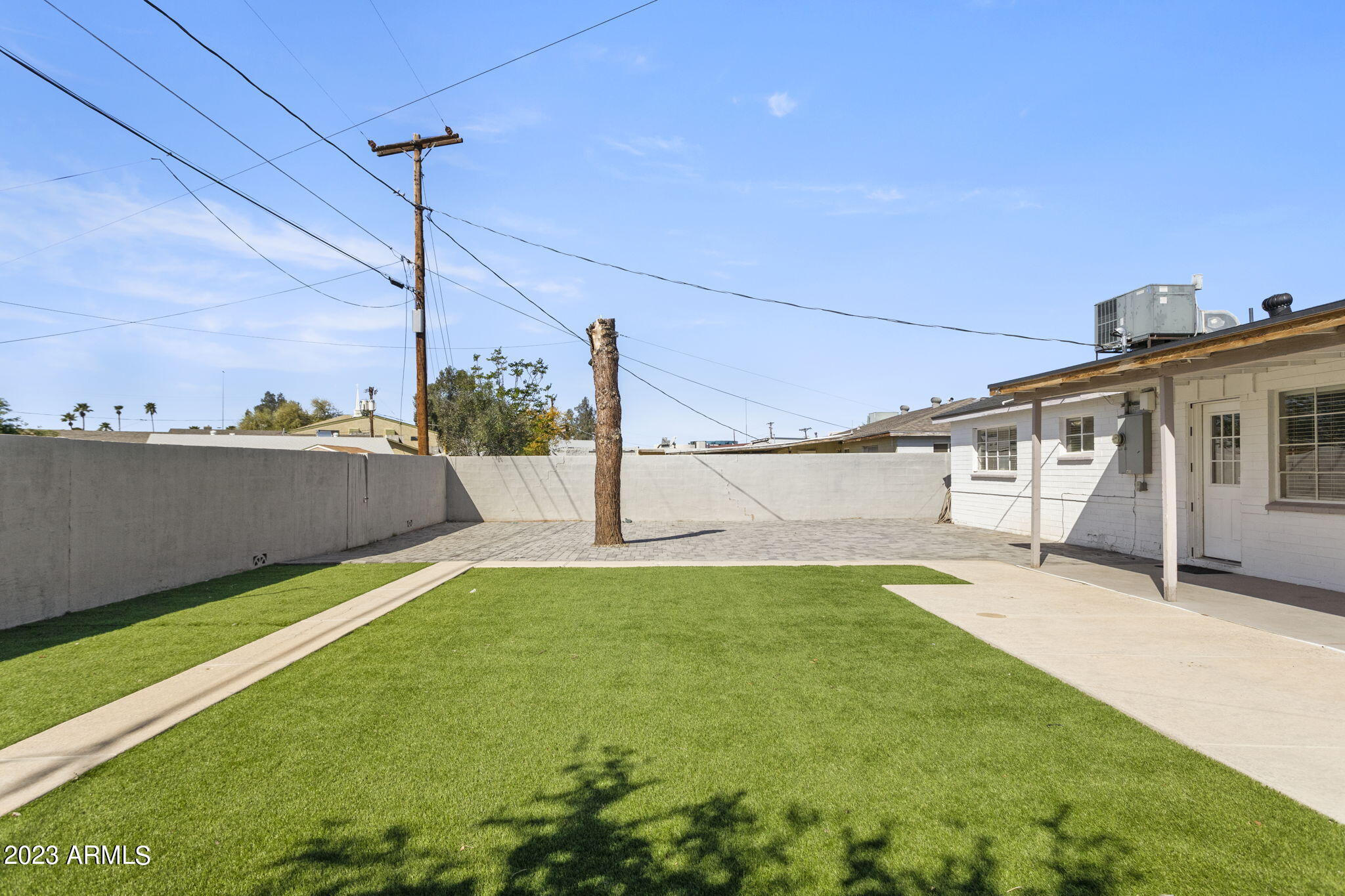 2525 West Freeway Lane Phoenix, AZ 85021 - Photo 32 of 41 a view of a house with a yard and sitting area
