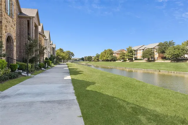 a view of a lake with a big yard