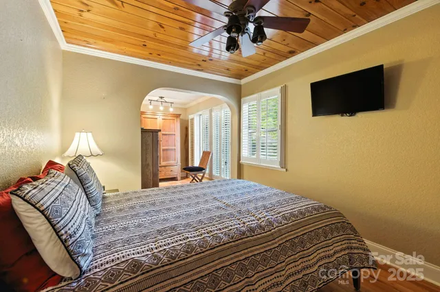 a bedroom with a bed and furniture