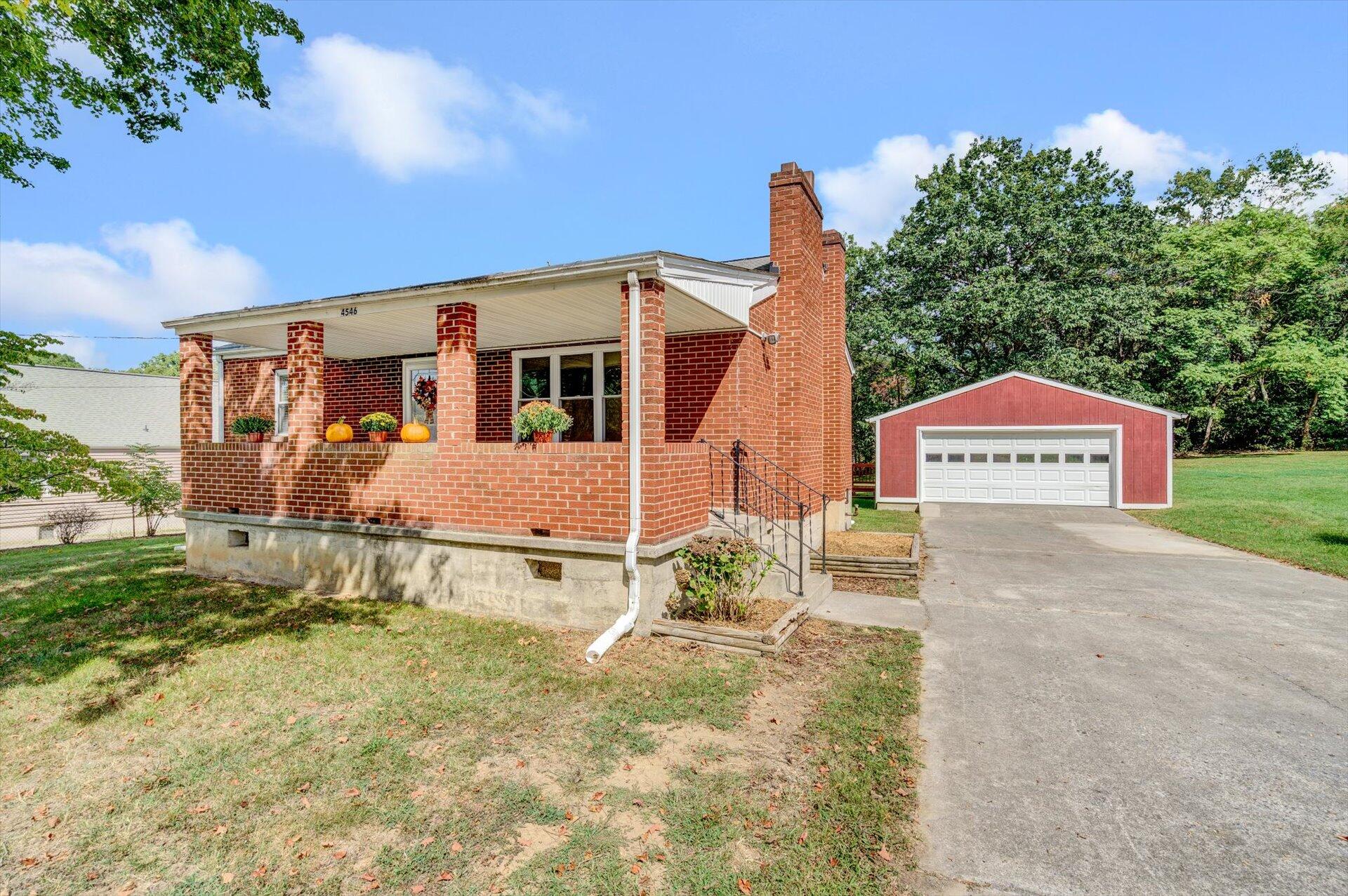 4546 Cowman Road Roanoke, VA 24014 - Photo 2 of 29 a view of a house with a yard