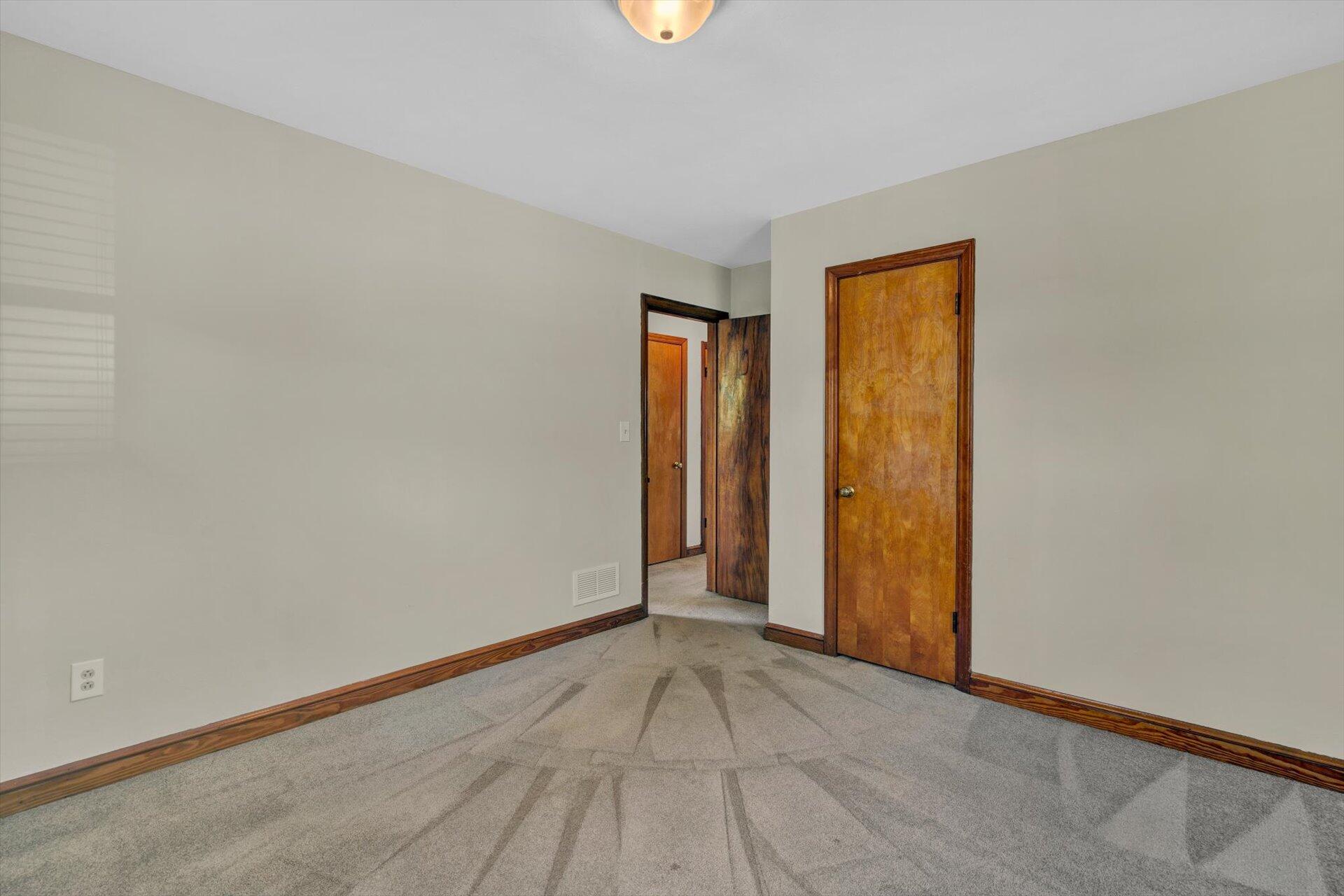 4546 Cowman Road Roanoke, VA 24014 - Photo 13 of 29 a view of an empty room with window and closet area
