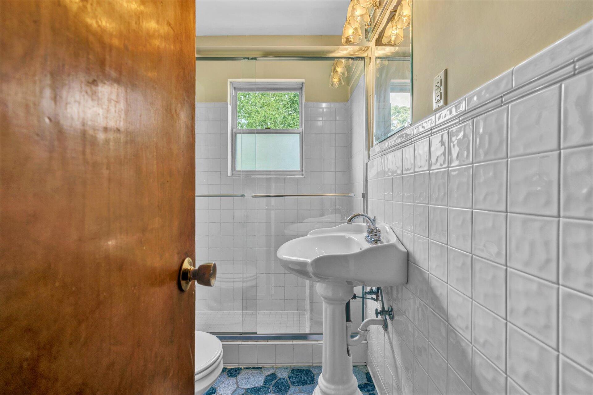 4546 Cowman Road Roanoke, VA 24014 - Photo 16 of 29 a bathroom with a sink and a mirror