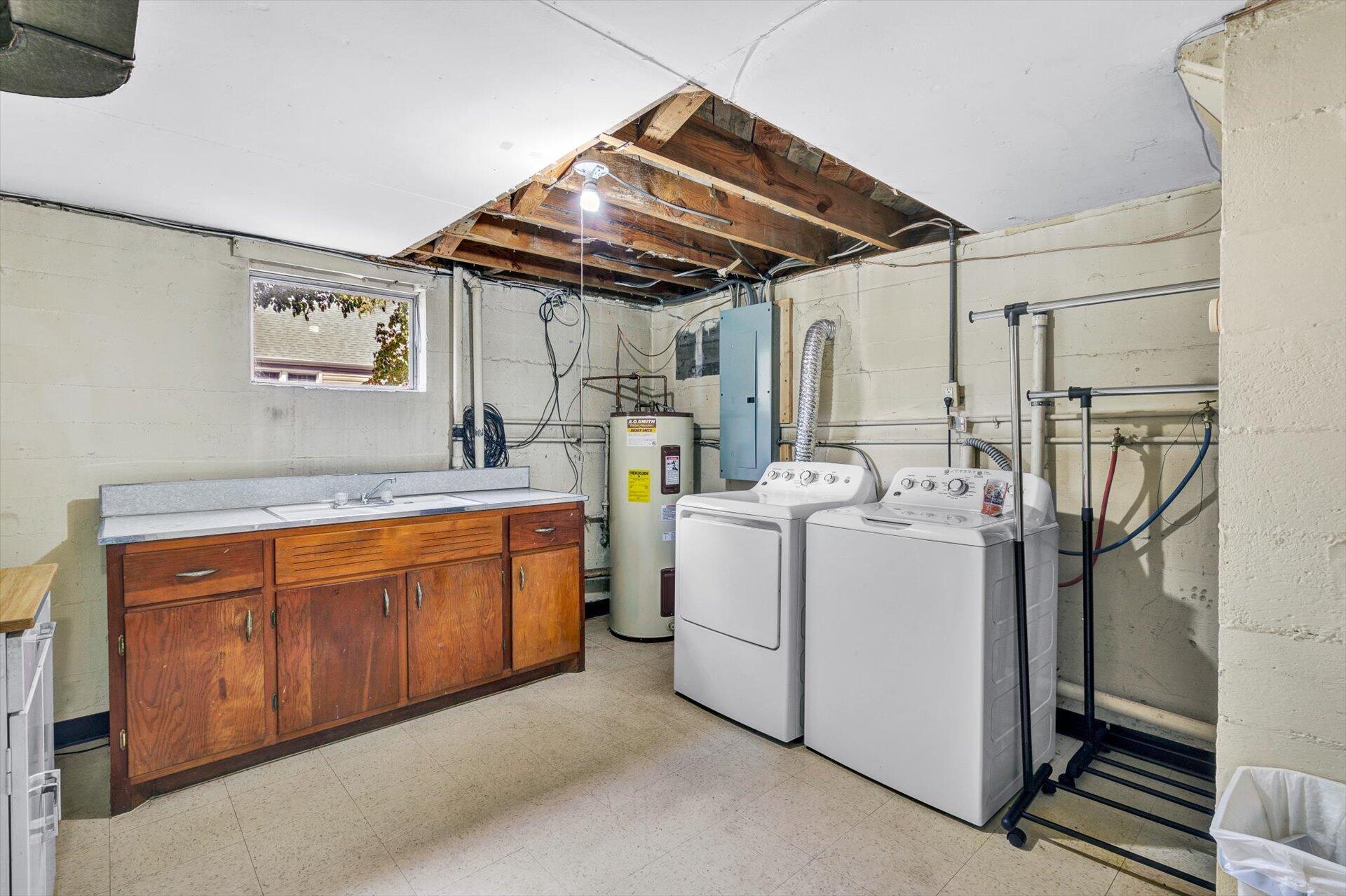 4546 Cowman Road Roanoke, VA 24014 - Photo 18 of 29 a view of a kitchen with storage and utility