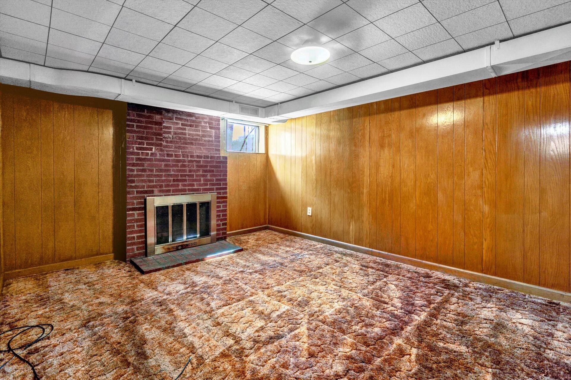 4546 Cowman Road Roanoke, VA 24014 - Photo 21 of 29 a view of an empty room with a fireplace