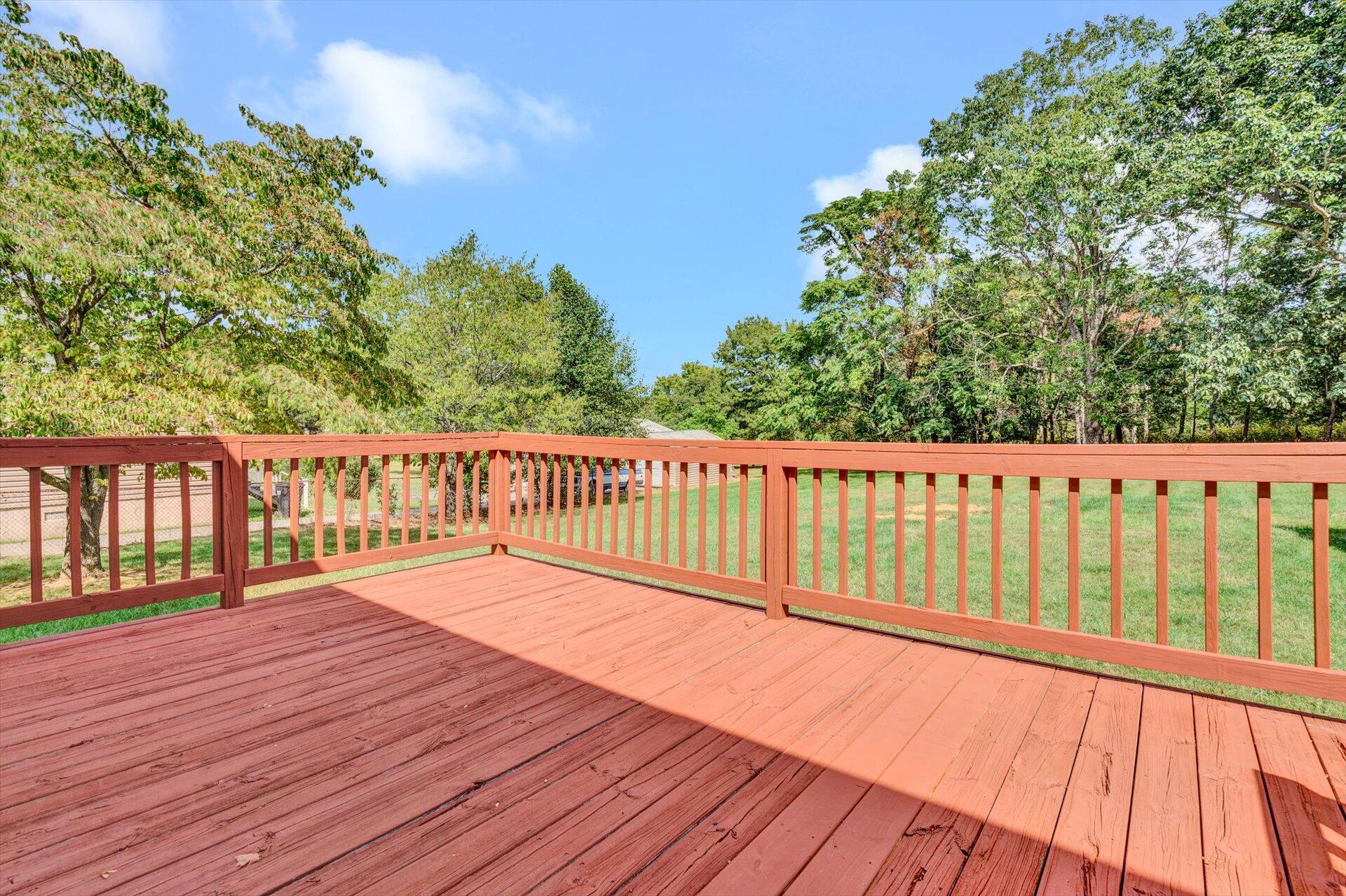 4546 Cowman Road Roanoke, VA 24014 - Photo 24 of 29 a view of wooden deck and a garden