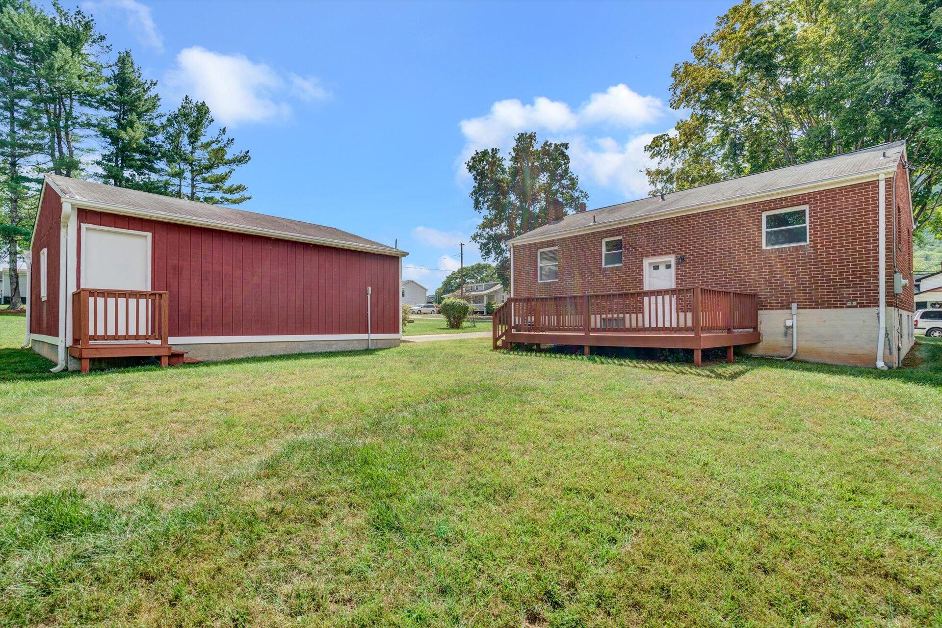 4546 Cowman Road Roanoke, VA 24014 - Photo 26 of 29 a view of a house with a backyard