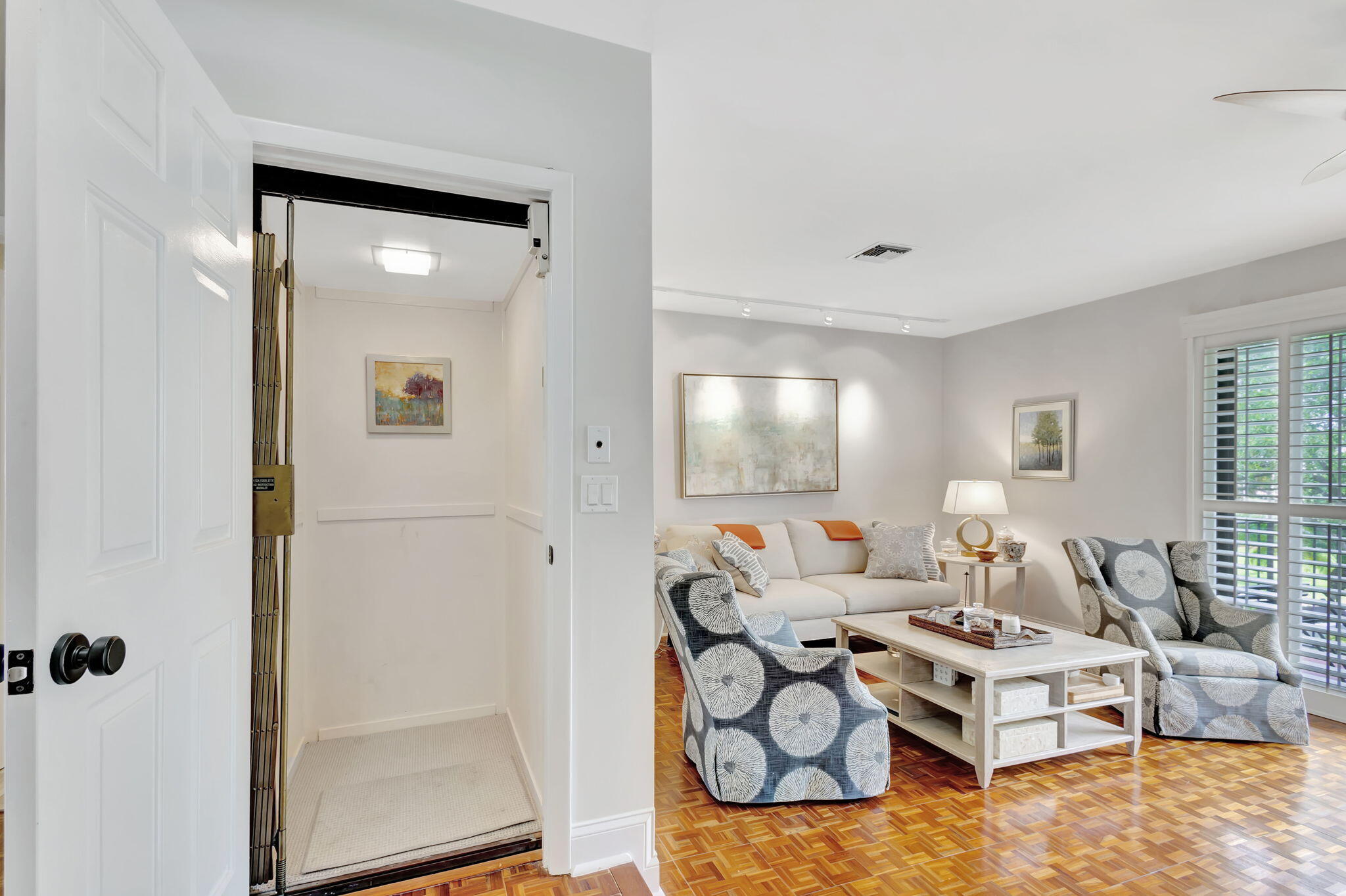 170 Celestial Way, Unit 83 Juno Beach, FL 33408 - Photo 15 of 70 a living room with furniture and a table