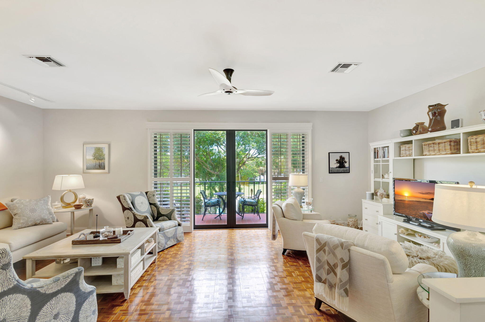 170 Celestial Way, Unit 83 Juno Beach, FL 33408 - Photo 16 of 70 a living room with furniture and a large window