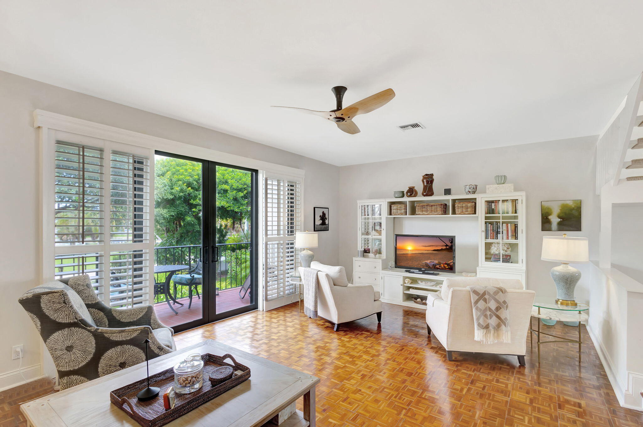 170 Celestial Way, Unit 83 Juno Beach, FL 33408 - Photo 17 of 70 a living room with furniture and a flat screen tv
