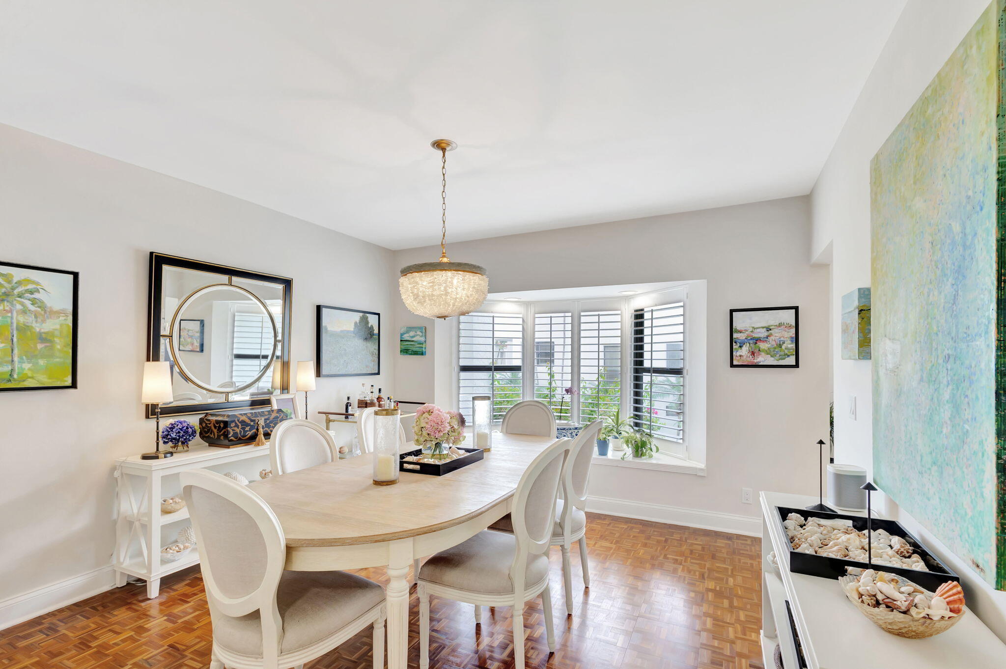 170 Celestial Way, Unit 83 Juno Beach, FL 33408 - Photo 19 of 70 a view of a dining room with furniture window and wooden floor