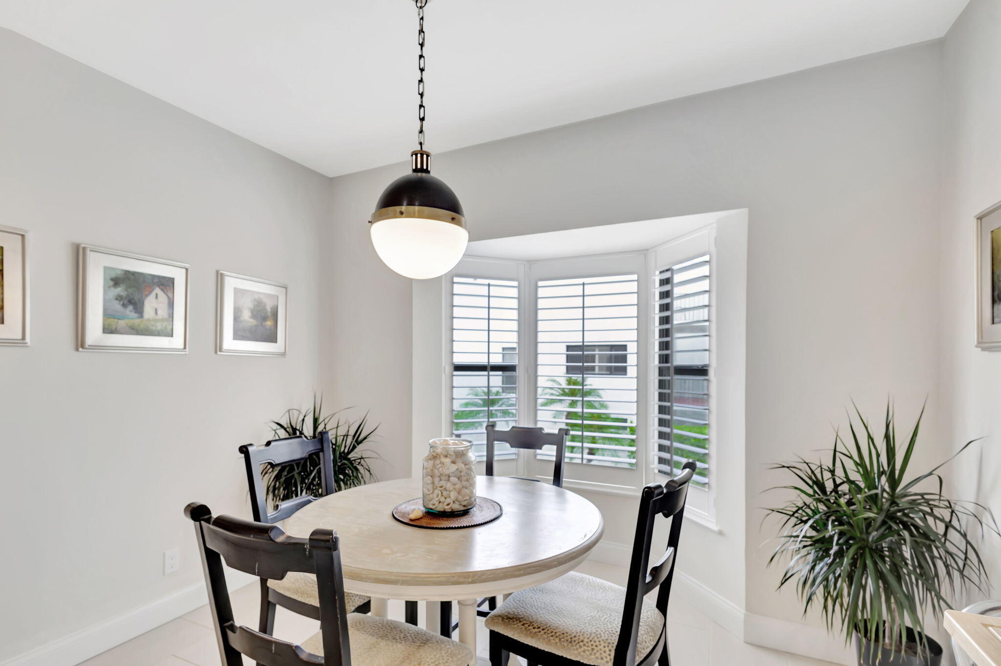 170 Celestial Way, Unit 83 Juno Beach, FL 33408 - Photo 24 of 70 a view of a dining room with furniture window and outside view