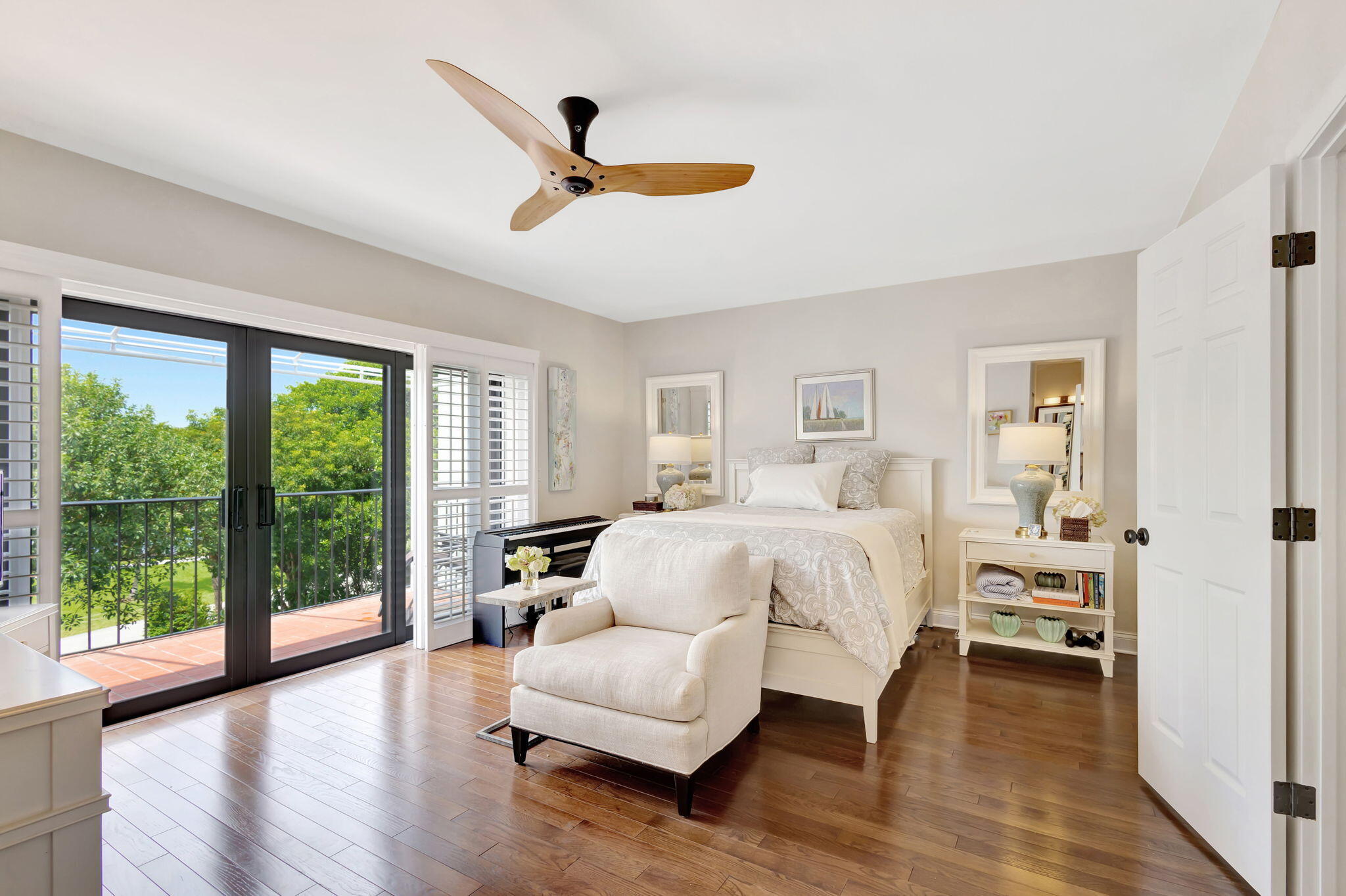 170 Celestial Way, Unit 83 Juno Beach, FL 33408 - Photo 29 of 70 a spacious bedroom with a large bed and a large window