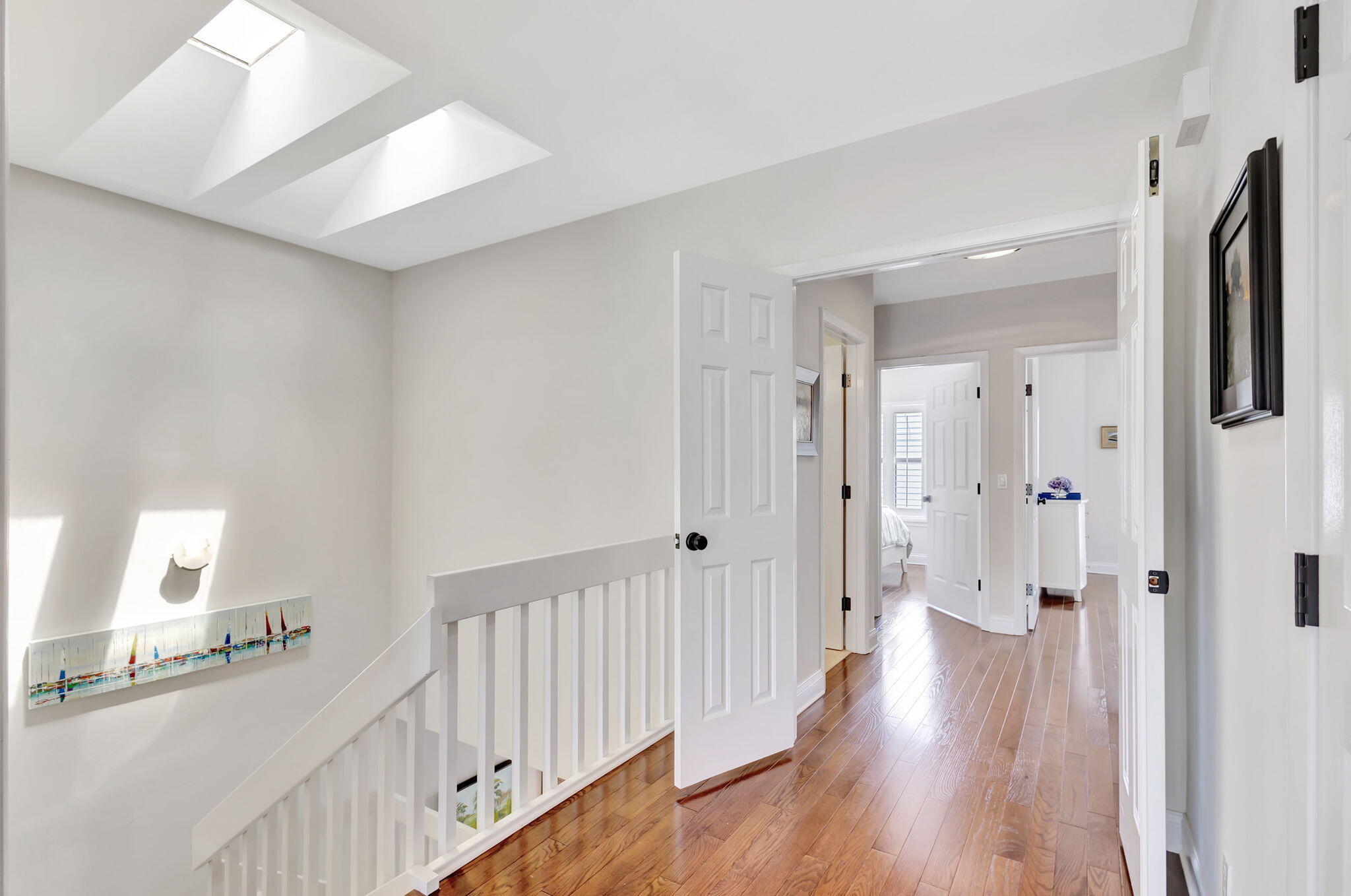170 Celestial Way, Unit 83 Juno Beach, FL 33408 - Photo 36 of 70 a view of a hallway with a hardwood floor