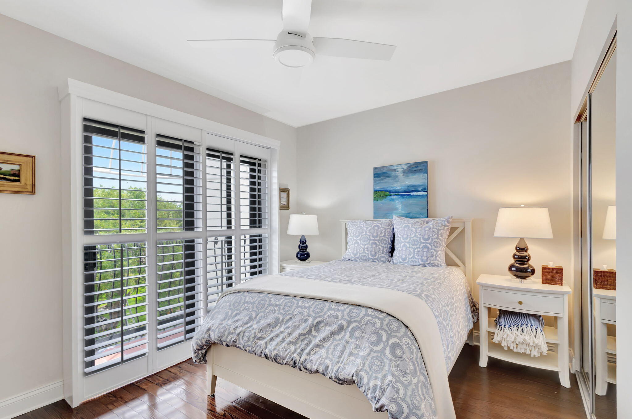 170 Celestial Way, Unit 83 Juno Beach, FL 33408 - Photo 38 of 70 a bedroom with a large bed and a window
