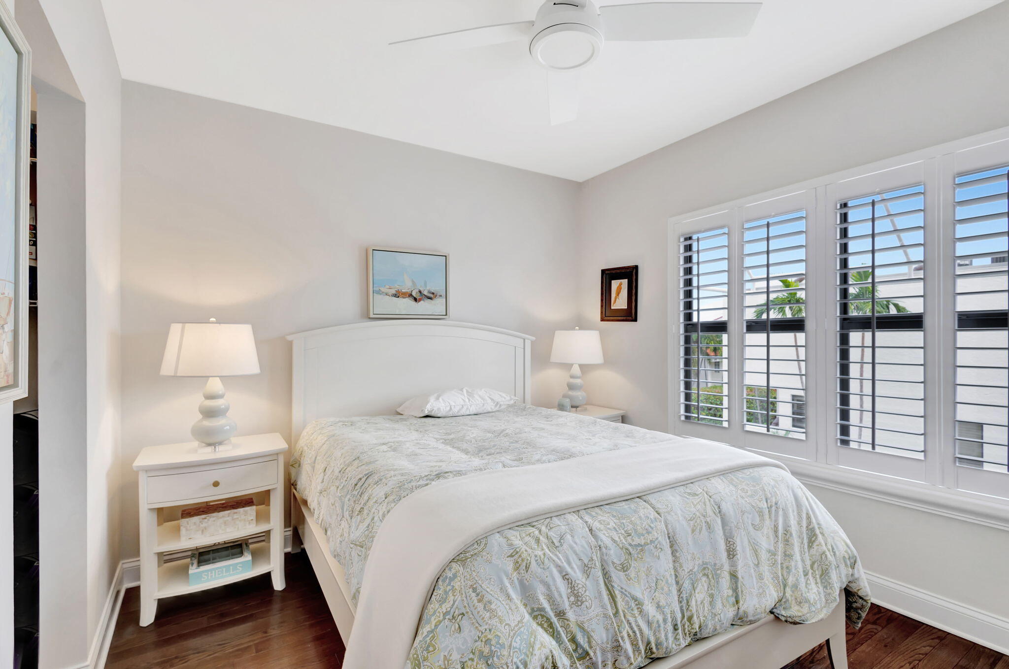 170 Celestial Way, Unit 83 Juno Beach, FL 33408 - Photo 41 of 70 a bedroom with a bed and a large window
