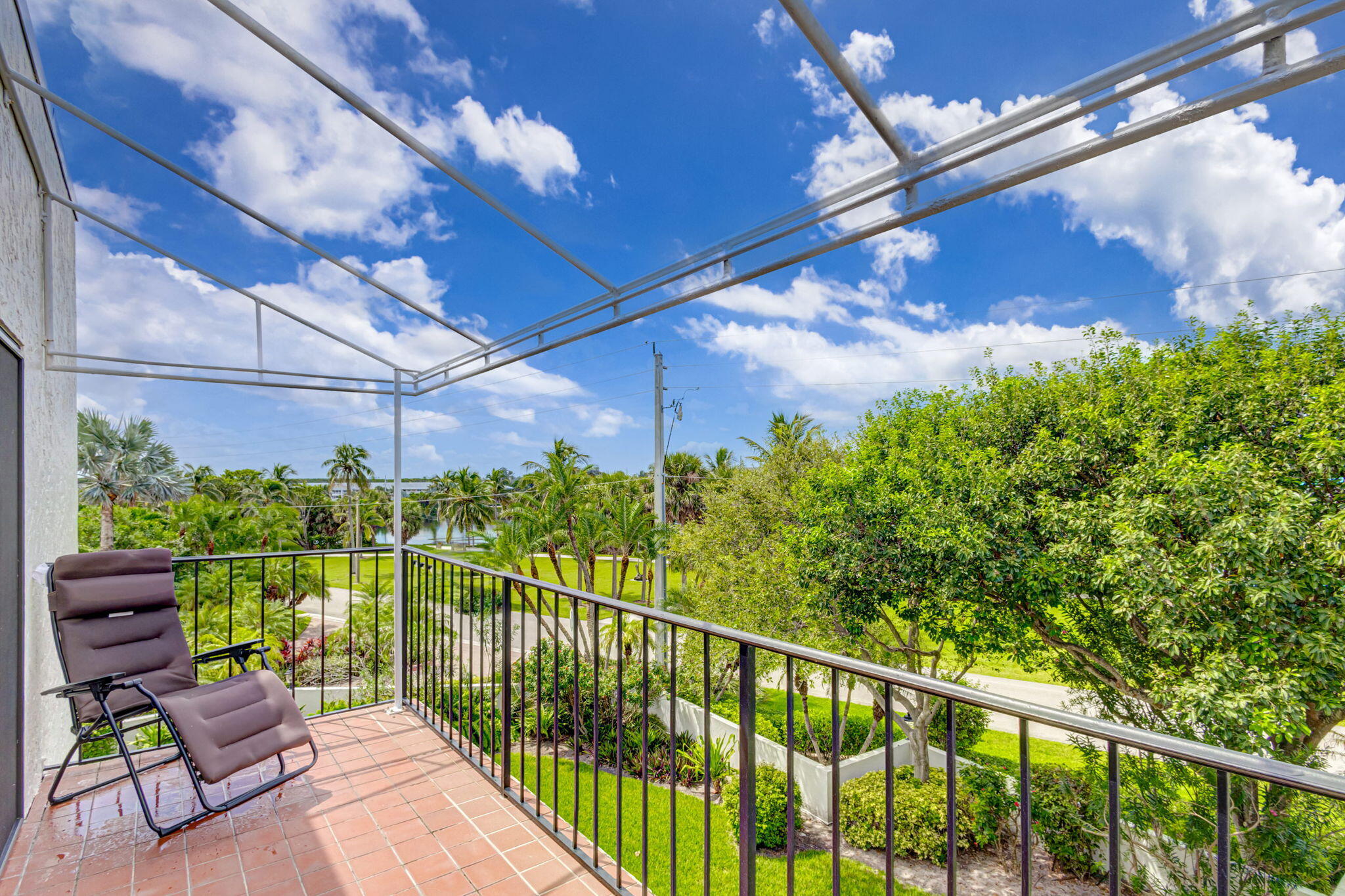 170 Celestial Way, Unit 83 Juno Beach, FL 33408 - Photo 49 of 70 a view of a balcony with chairs