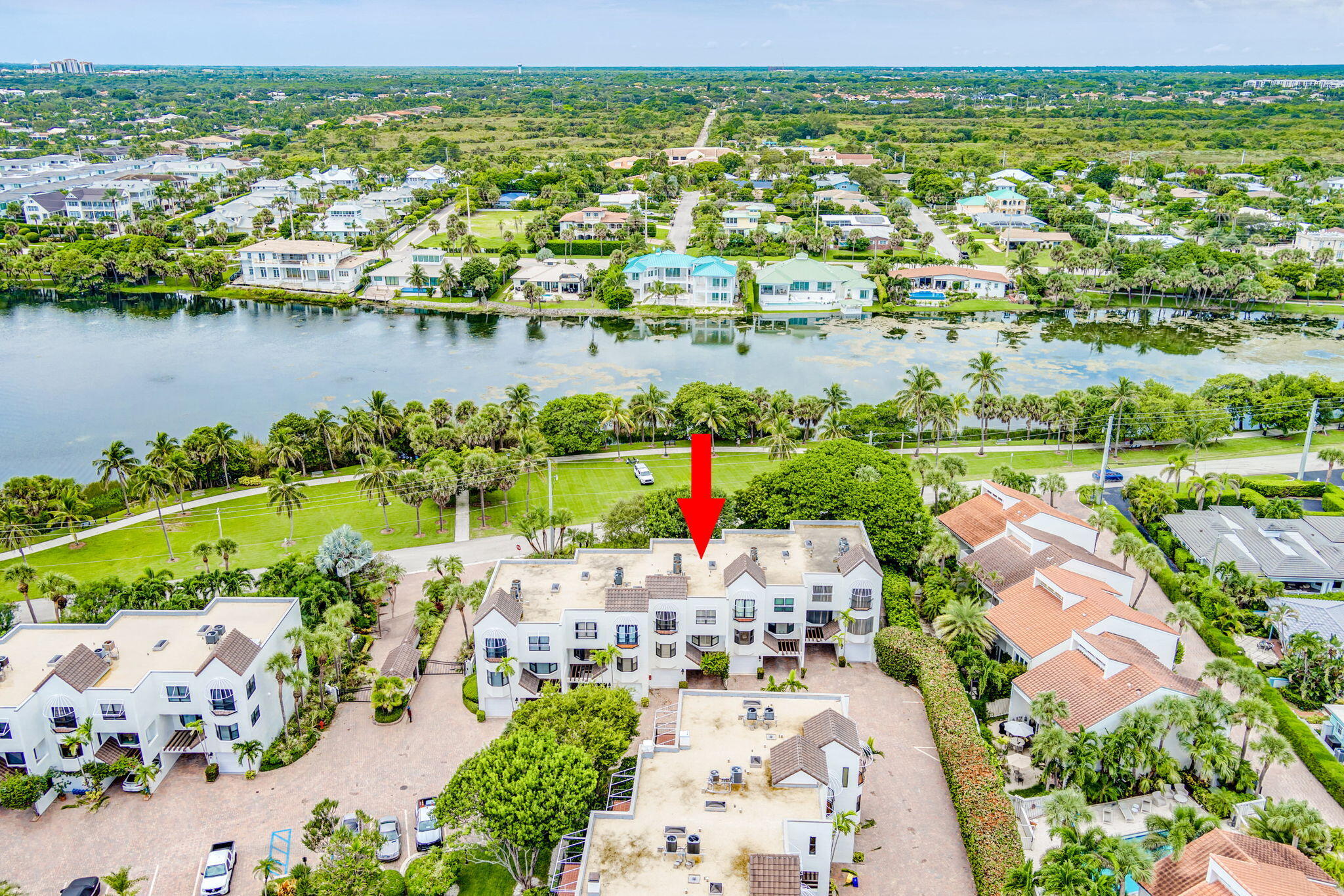 170 Celestial Way, Unit 83 Juno Beach, FL 33408 - Photo 64 of 70 an aerial view of a city with lake view