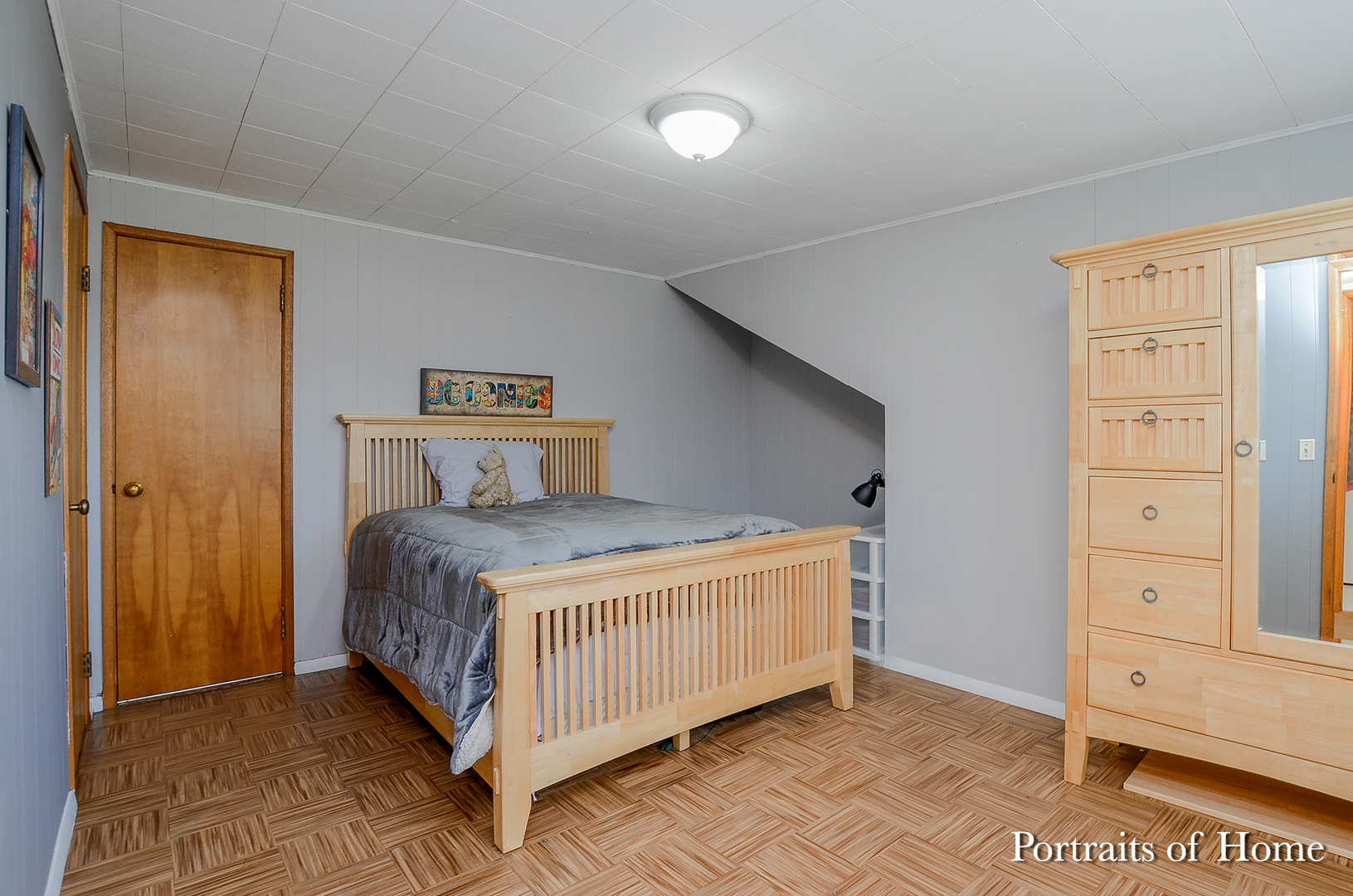 1106 North Randall Road Aurora, IL 60506 - Photo 22 of 27 a bedroom with a bed and cabinet