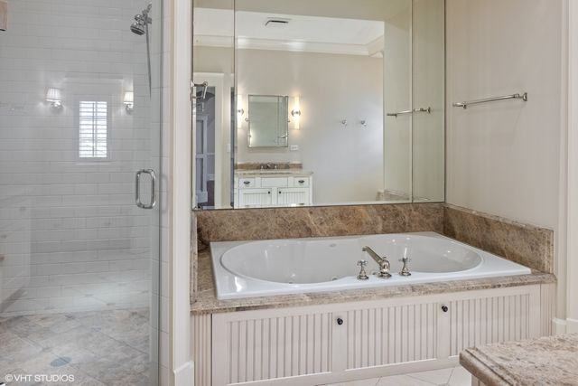 a view of a livingroom with wooden floor and entryway