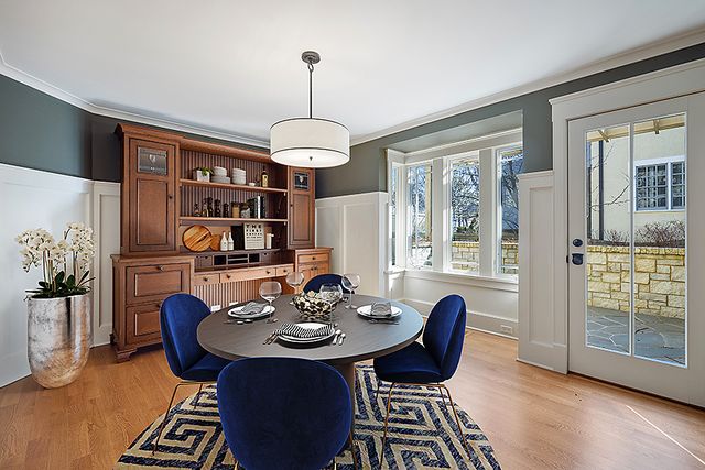 a view of a patio with couches chairs and potted plants