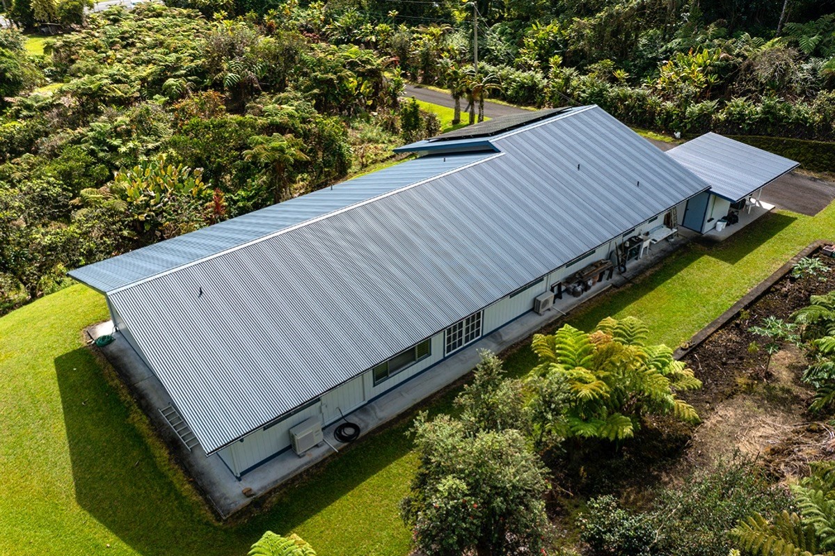 17-294 Volcano Road Kurtistown, HI 96749 - Photo 1 of 30 a view of a backyard with sitting area