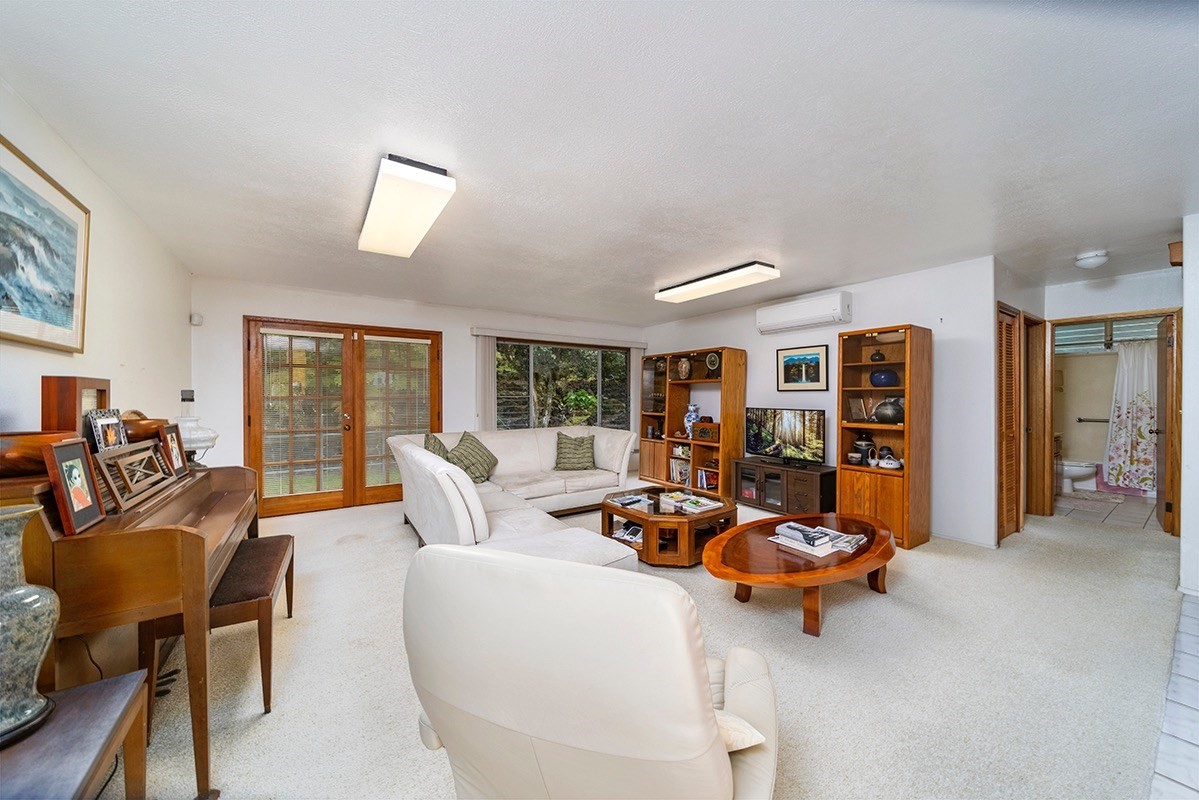 17-294 Volcano Road Kurtistown, HI 96749 - Photo 2 of 30 a living room with furniture and large window