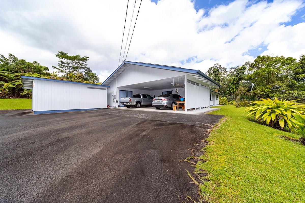 17-294 Volcano Road Kurtistown, HI 96749 - Photo 28 of 30 a view of a house with basketball court