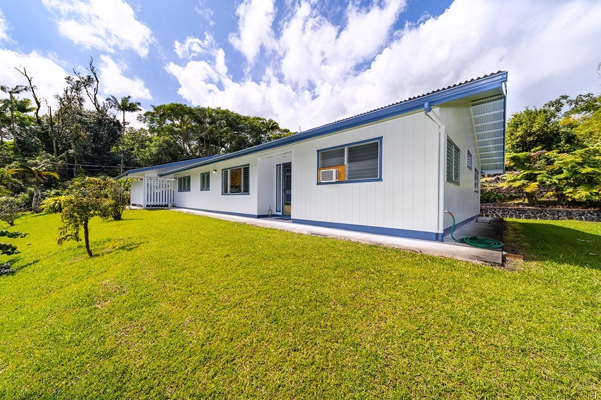 17-294 Volcano Road Kurtistown, HI 96749 - Photo 6 of 30 a view of a house with pool and a yard