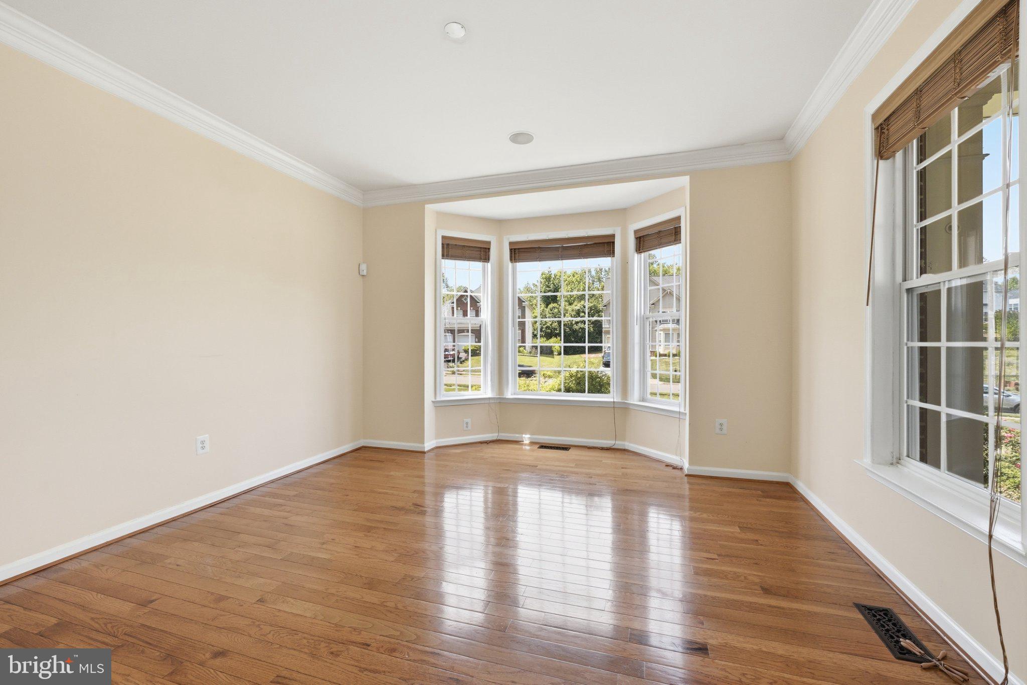 3679 Expedition Drive Triangle, VA 22172 - Photo 6 of 65 a view of empty room with wooden floor and fan