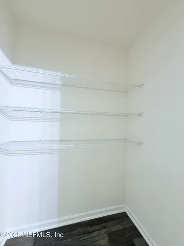 a view of small space with racks on the wall