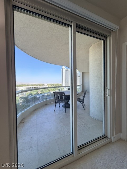 2777 Paradise Road, Unit 807 Las Vegas, NV 89109 - Photo 15 of 61 Step out onto this spacious tiled balcony offering sweeping city and sky views.