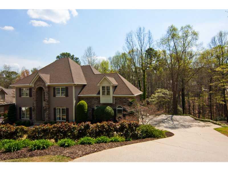 Exterior Front. Extraordinary Home in Windward! Exterior stucco replaced with a compliment of stone, cement shingles and cement siding!