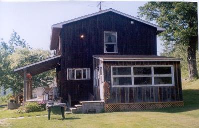 3 River Road Savoy, MA 01256 - Photo 2 of 2 a front view of a house with a yard