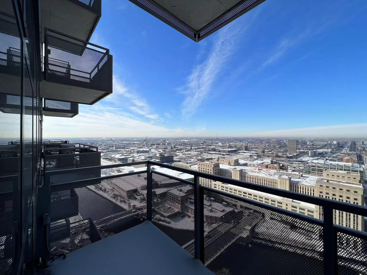 235 West Van Buren Street, Unit 4214 Chicago, IL 60607 - Photo 14 of 16 a view of a city from a balcony